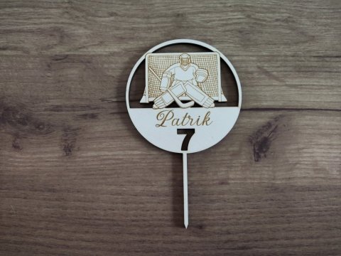 Zápich na dort s hokejovým brankářem a brankou